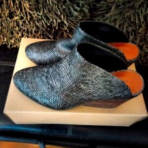 Lucky Brand, Mules, the color is a metallic black, women's size 9 1/2